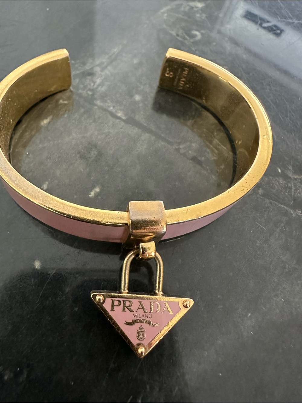 Prada Gold-Tone Cuff Bracelet with Pink Enamel Triangle Logo Charm